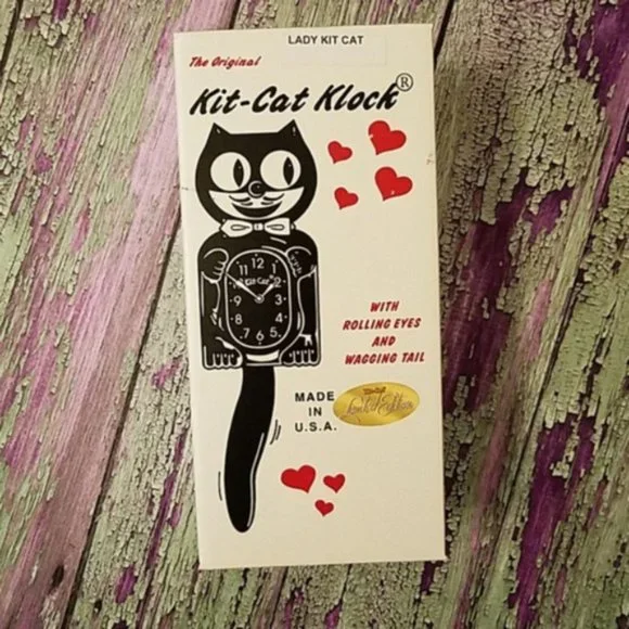 RETIRED urban outfitters Pink Satin Lady Kit Cat Klock